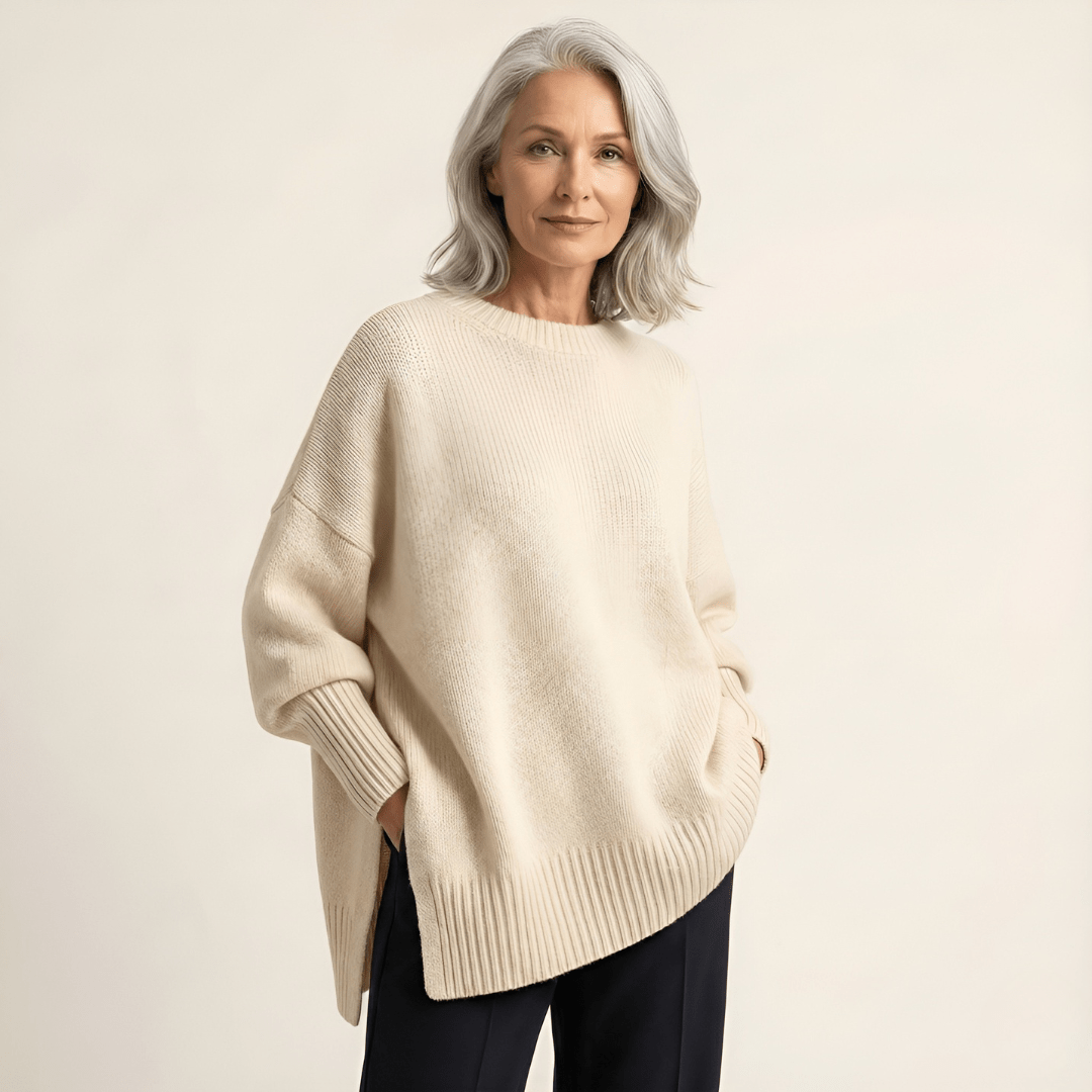 Livia I Maglione elegante con fondo asimmetrico